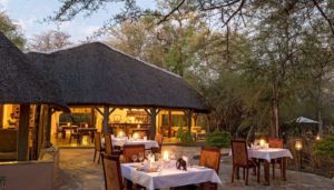 Enjoy outdoor dining at the Etosha Aoba Lodge in the Onguma Nature Reserve, Namibia